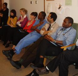 Picture of Doctors listening to training